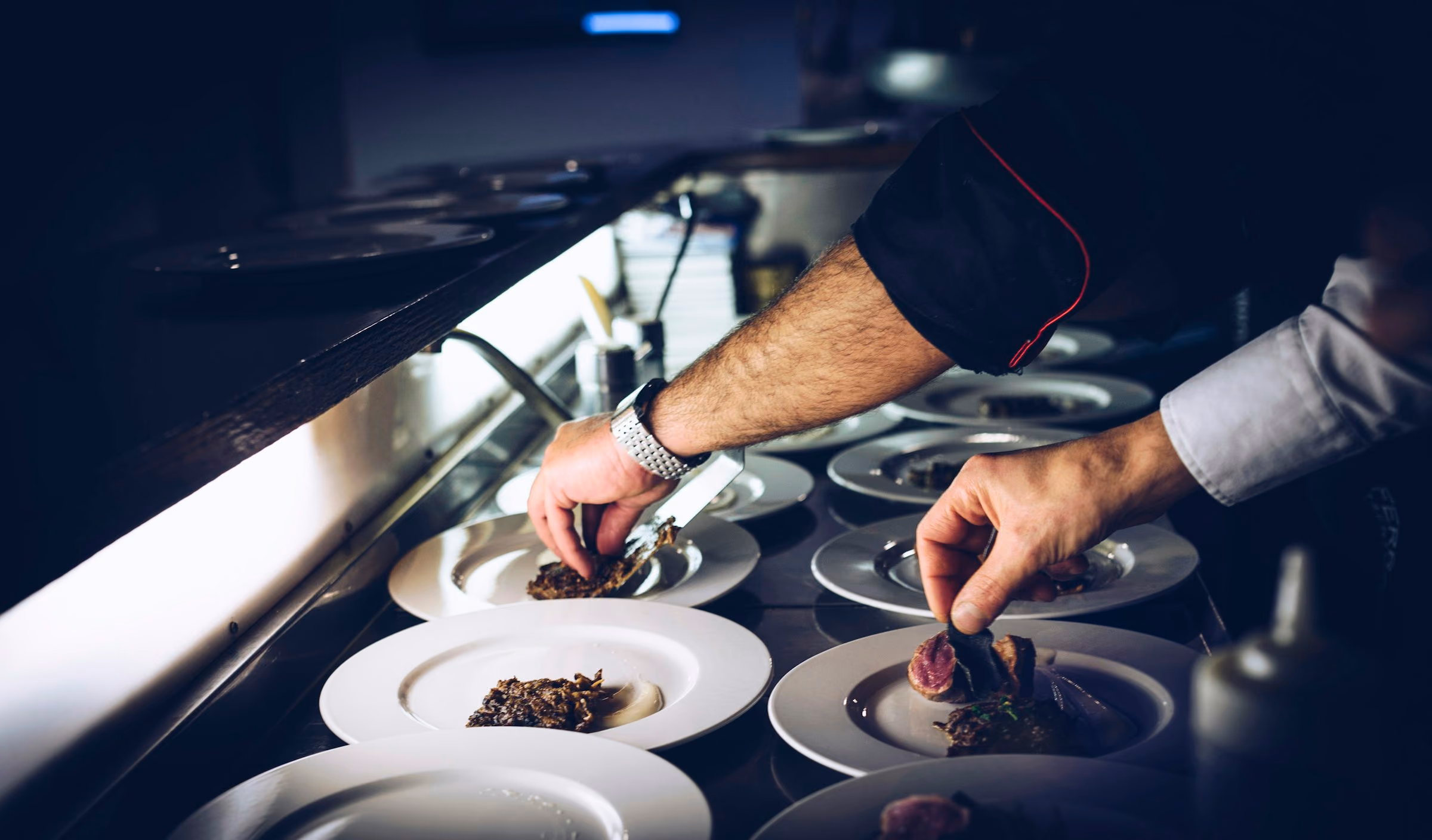 Brigade in navy plating a course at the pass, hands only
