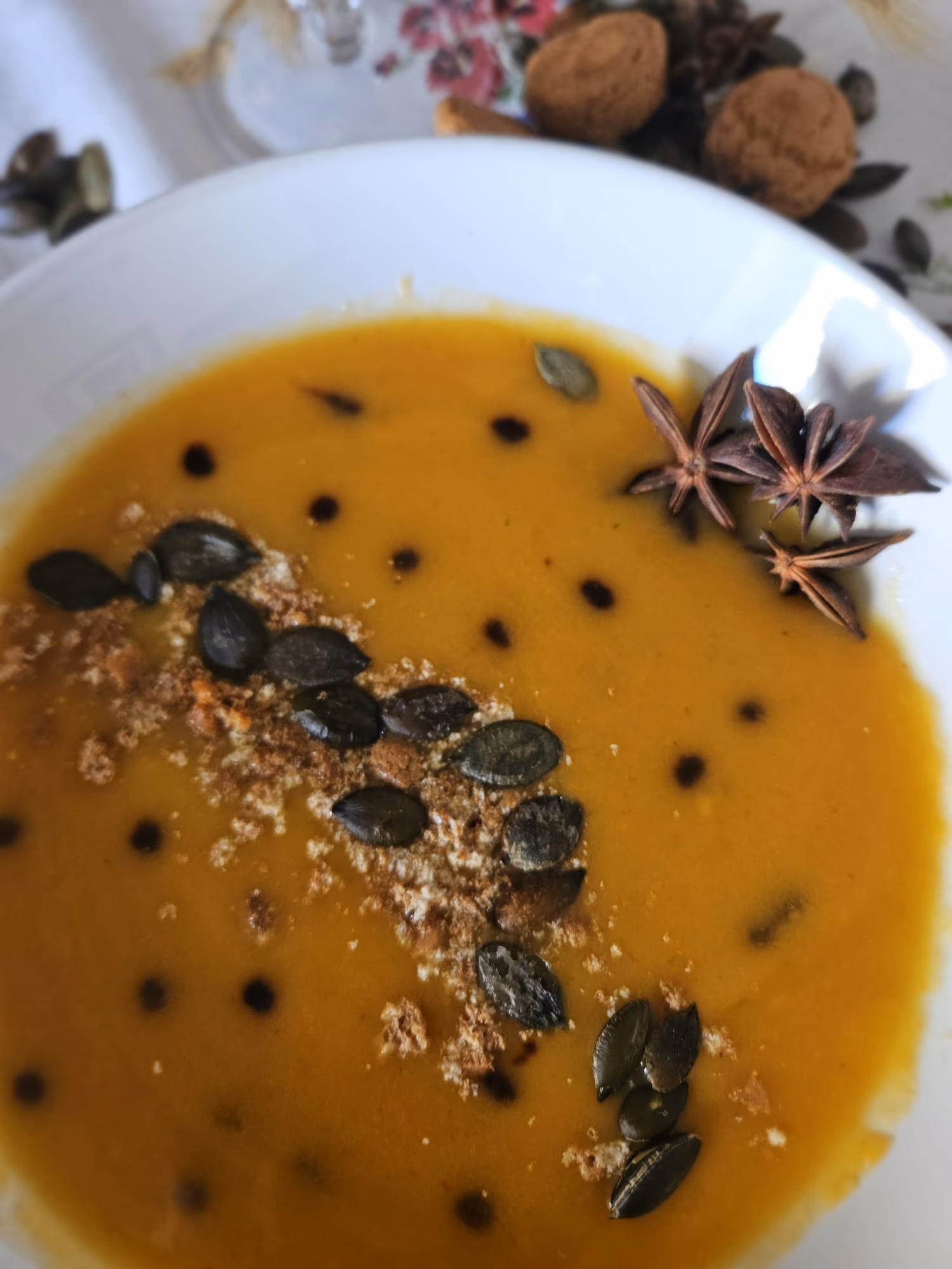 Pumpkin velouté with toasted pumpkin seeds and star anise